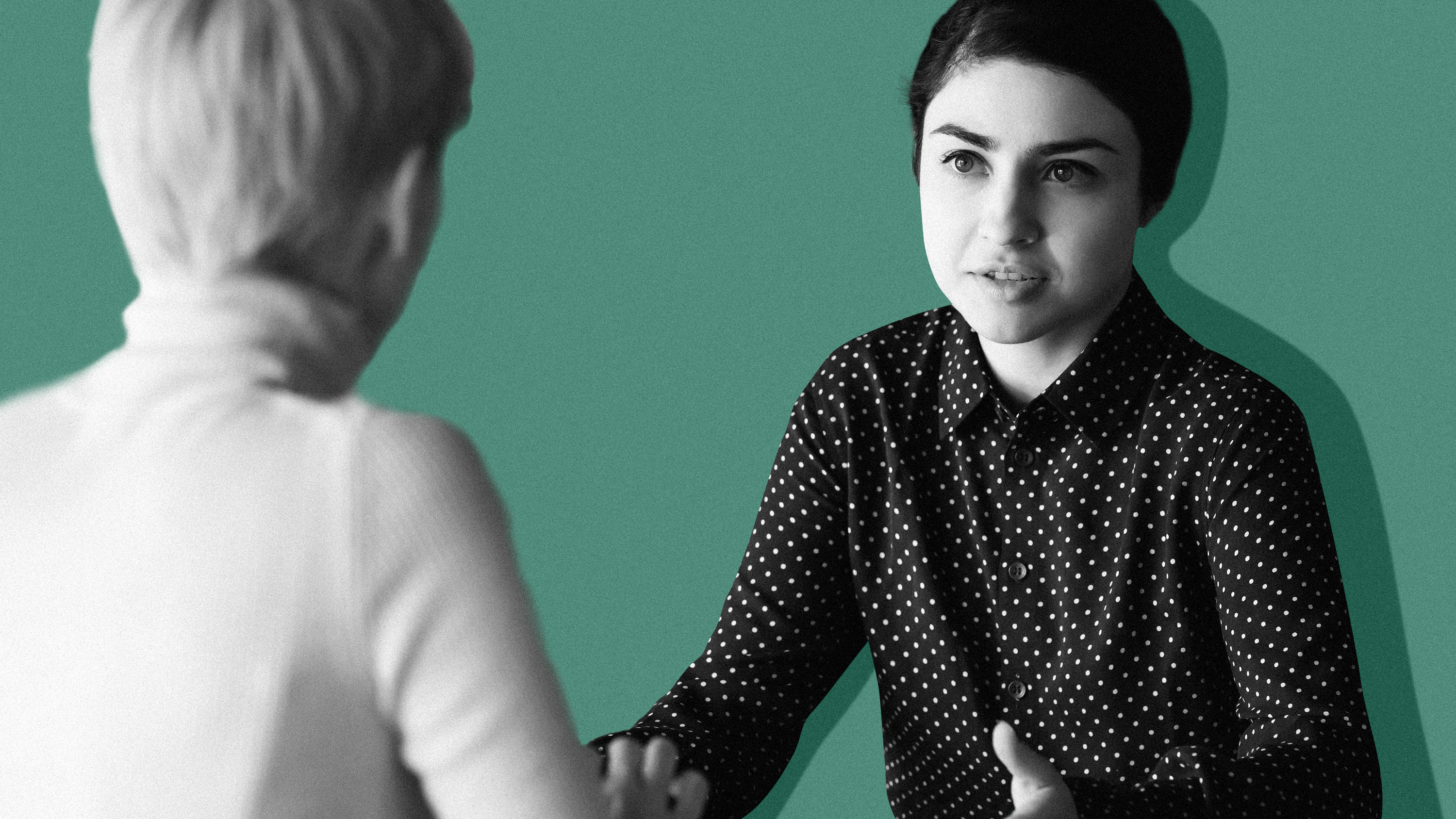 image of two people speaking to each other with green background